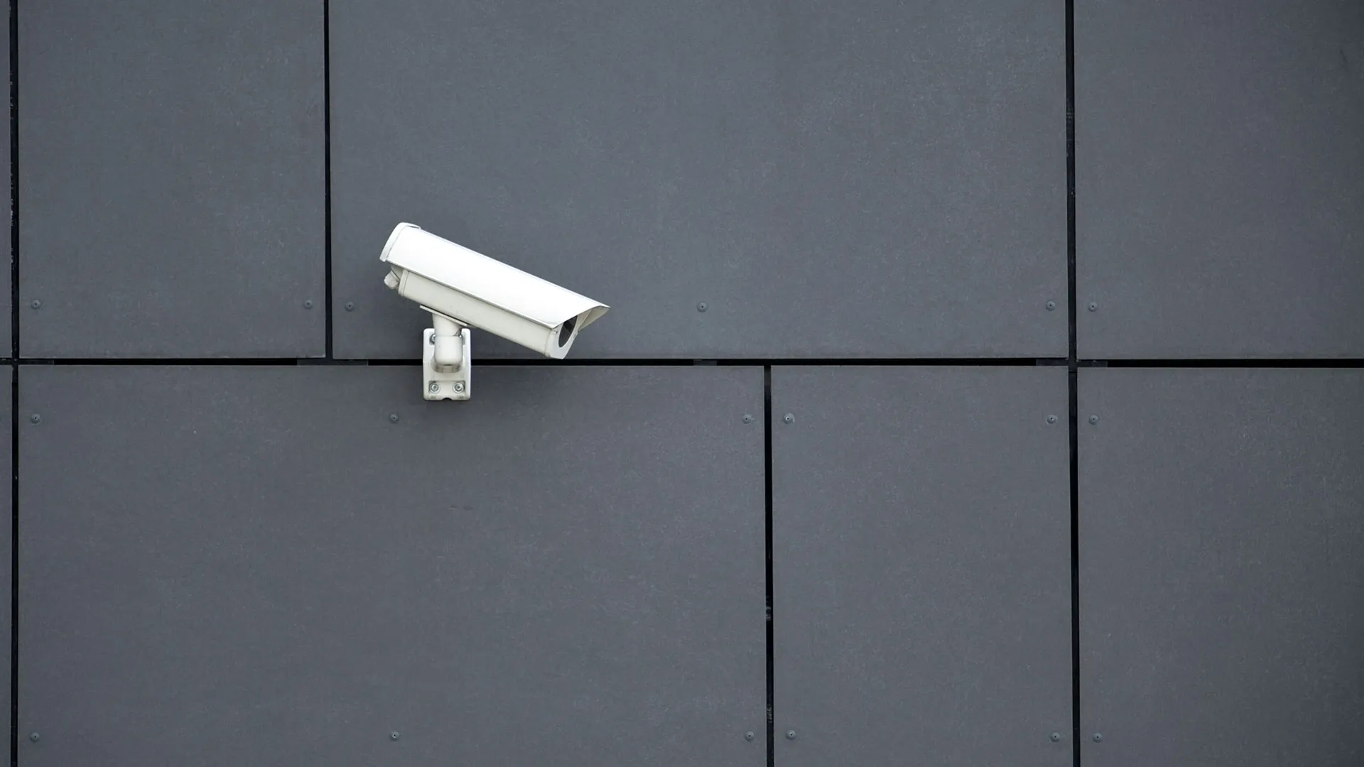 Security camera installed on a wall